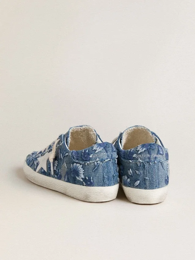 Super-Star LTD da donna in denim azzurro con stella in pelle bianca e fiori ricamati