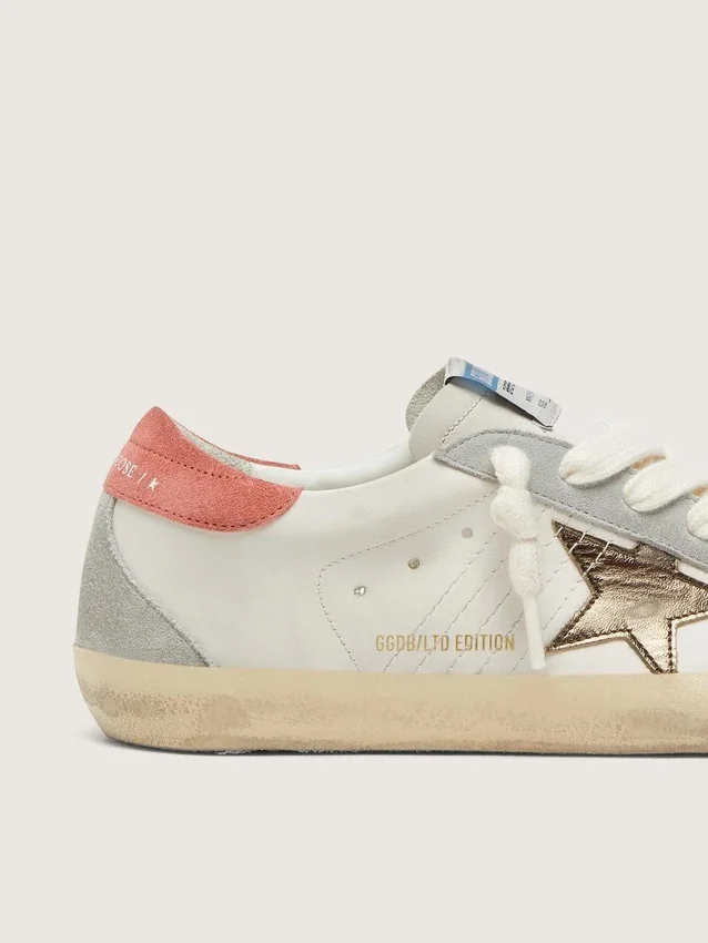 Super-Star LTD da donna in pelle bianca con stella in bronzo metallizzato