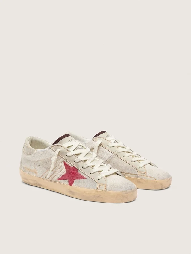 Super-Star LTD da donna in pelle di pony bianca con stella in pelle scamosciata rossa