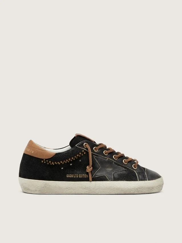 Super-Star LTD da donna in pelle glitterata nera con stella in pelle nera