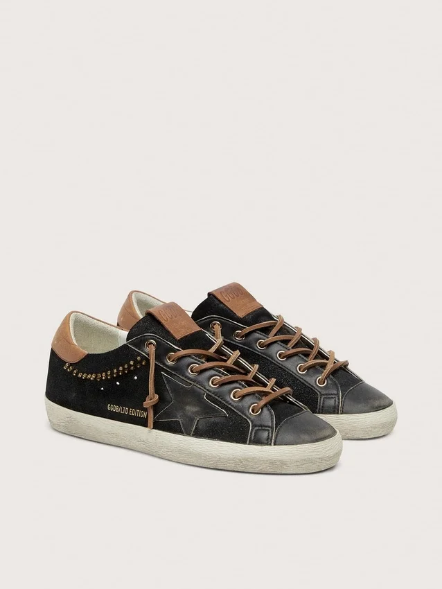 Super-Star LTD da donna in pelle glitterata nera con stella in pelle nera