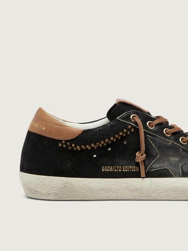 Super-Star LTD da donna in pelle glitterata nera con stella in pelle nera