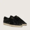 Super-Star LTD da donna in pelle nera con stampa coccodrillo, stella in pelle scamosciata nera e linguetta sul tallone