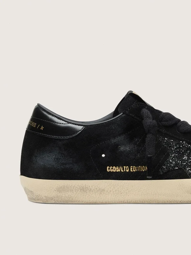 Super-Star LTD da donna in pelle scamosciata nera con stella glitterata nera e linguetta sul tallone in pelle nera