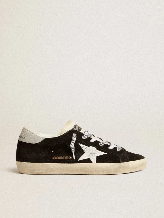 Super-Star LTD da donna in pelle scamosciata nera con stella stampata bianca e linguetta sul tallone con glitter argento