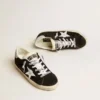 Super-Star LTD da donna in pelle scamosciata nera con stella stampata bianca e linguetta sul tallone con glitter argento