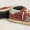 Super-Star LTD da donna in pelle scamosciata rossa con stella glitterata argento e linguetta sul tallone in pelle laminata