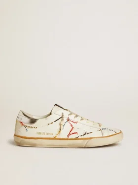 Super-Star LTD da uomo con stella traforata e linguetta sul tallone in pelle metallizzata