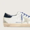 Super-Star LTD da uomo in pelle bianca con stella in pelle scamosciata e linguetta sul tallone in pelle blu