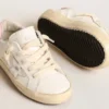 Super-Star Young con stella in pelle argentata e linguetta sul tallone rosa