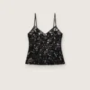Top da donna in tulle nero con motivo floreale in paillettes nere