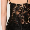 Top da donna in tulle nero con motivo floreale in paillettes nere