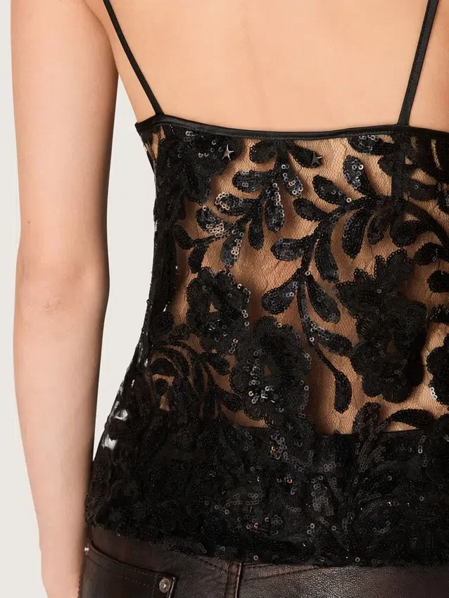 Top da donna in tulle nero con motivo floreale in paillettes nere