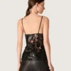 Top da donna in tulle nero con motivo floreale in paillettes nere