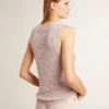 Top in maglia a rete con paillettes e dettagli a contrasto