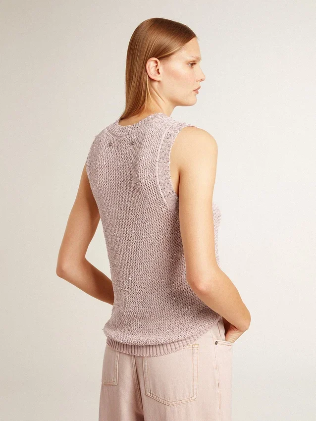 Top in maglia a rete con paillettes e dettagli a contrasto