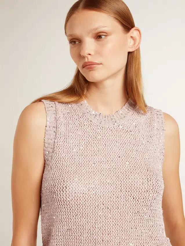 Top in maglia a rete con paillettes e dettagli a contrasto