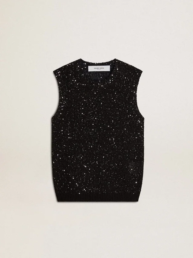 Top in maglia a rete nera con paillettes e dettagli a contrasto