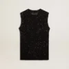 Top in maglia a rete nera con paillettes e dettagli a contrasto