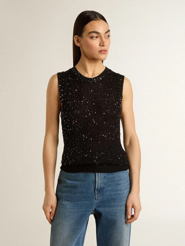Top in maglia a rete nera con paillettes e dettagli a contrasto