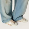 True-Star da donna in pelle scamosciata grigio chiaro con stella argentata metallizzata e linguetta sul tallone