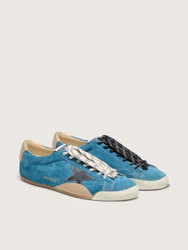 True-Star da donna in pelle scamosciata verde acqua con stella nera e linguetta sul tallone color crema