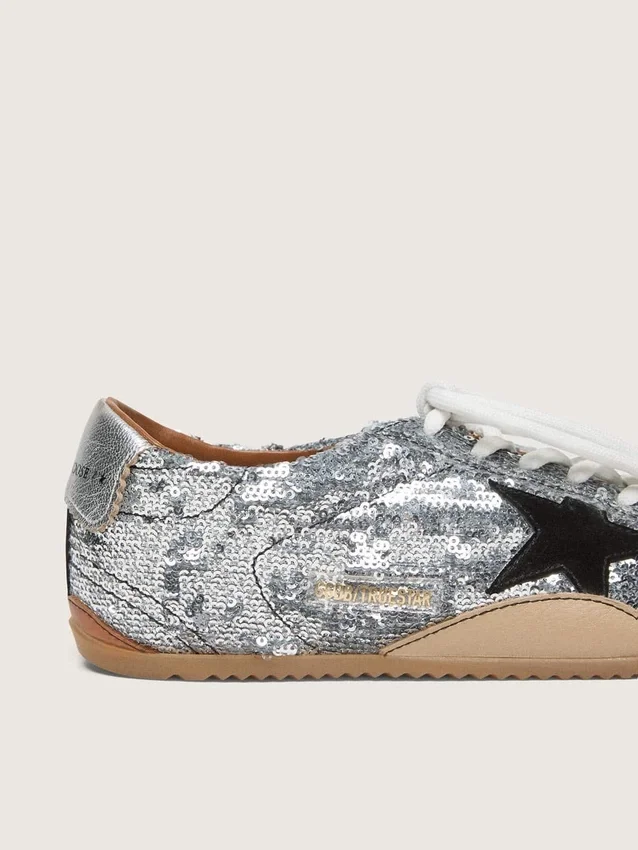 True-Star da donna con paillettes argentate, stella nera e linguetta sul tallone in pelle argentata