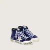 Young Francy Penstar in paillettes blu con stella in pelle scamosciata bianca